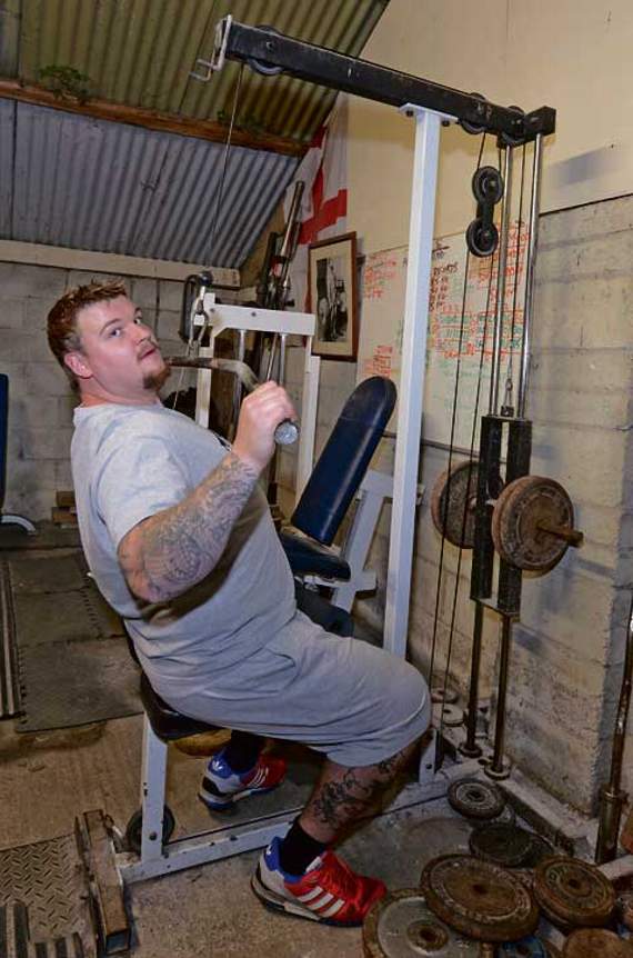 Rob doing the lat pull down during a training session at the SS Powerlifting gym. Picture: Adrian Jasper