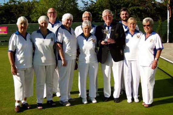 Stratton’s mixed Millenium team reach the county final against St Austell at Dunheved on Friday,?September 7. Pictured are the team with their runners-up trophy which is being held by captain Gerald Maynard. Back row: Steve Morris, Dave Clark and Aron Braund. Front row: Pat Nagy, Ann Morris, Daphne Claydon, Eunice Hook, Gerald Maynard, Ann Maynard and Jill Fell. Missing from picture: Simon Gambriel and Steve Jones.