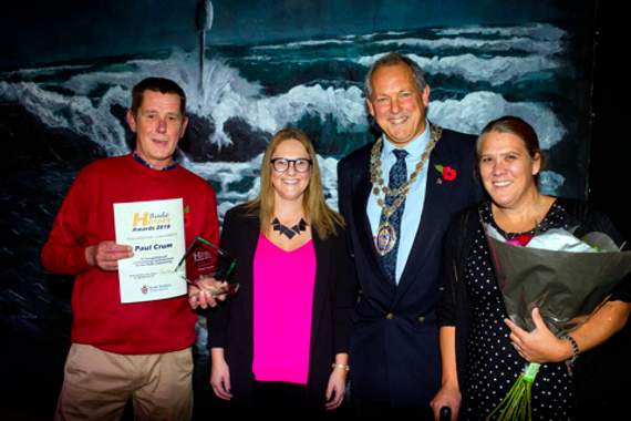 Paul Crum is awarded for his dedication to Bude Rubbish Action Group (BRAG), pictured alongside his nominator Katie Brind, mayor Bob Willingham and partner Laila.