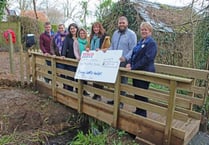 Two schools receive generous cheques from Tesco