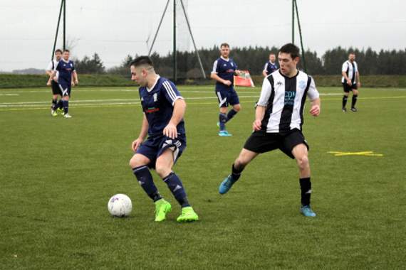 Halwill seconds striker Tudor Placinta looks to keep possession during their 7-2 victory over higher league outfit Priory in the Bill Slee Cup. Picture: Dawn Bewes