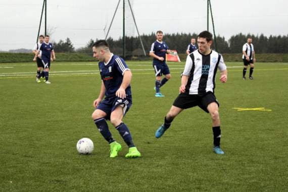 Halwill seconds striker Tudor Placinta looks to keep possession during their 7-2 victory over higher league outfit Priory in the Bill Slee Cup. Picture: Dawn Bewes