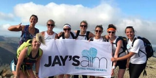 Mission accomplished — eight friends complete the Three Peaks Challenge raising thousands for Jay's AIM