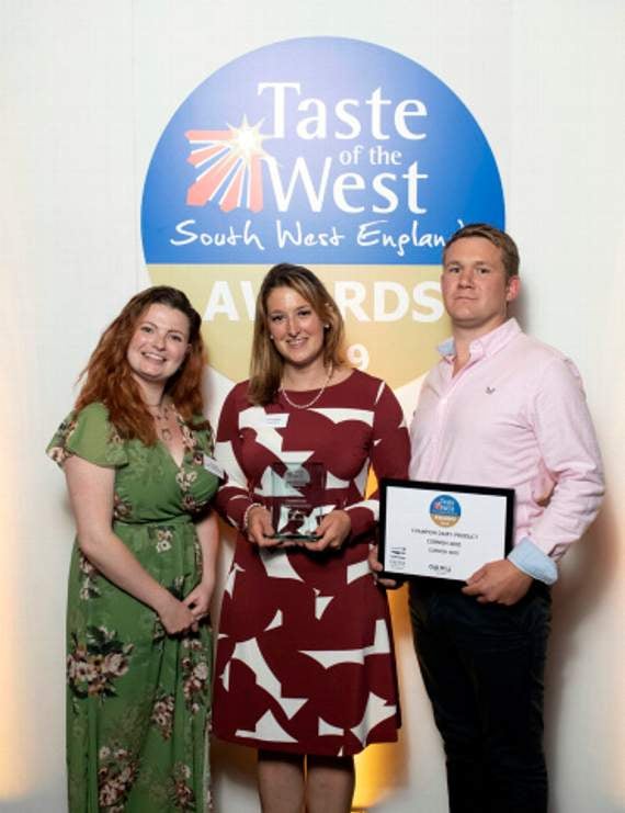 Pictured from left, a representative from Exeter Cookery School, Gemma Smale-Rowland and her Husband Craig Rowland.