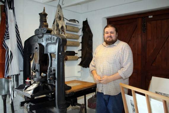 From Arcane Studios, Ian Steadman is pictured with an Albion Press.