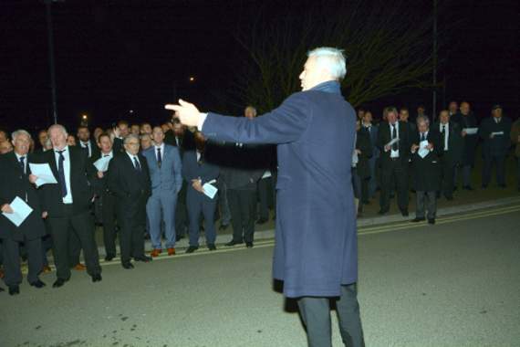 Steve Cowling conducting members of the Bude Death Club outside the Falcon Hotel at midnight.
