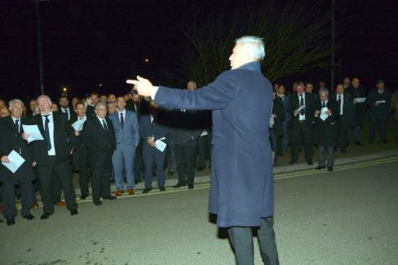 Steve Cowling conducting members of the Bude Death Club outside the Falcon Hotel at midnight.