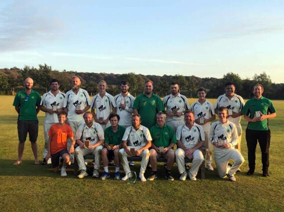 Holsworthy skipper Ryan Walter receiving the Division Three East trophy from Pencarrow CC representative Stuart Ellis following the conclusion of their county final with St Ives at Pencarrow in September.