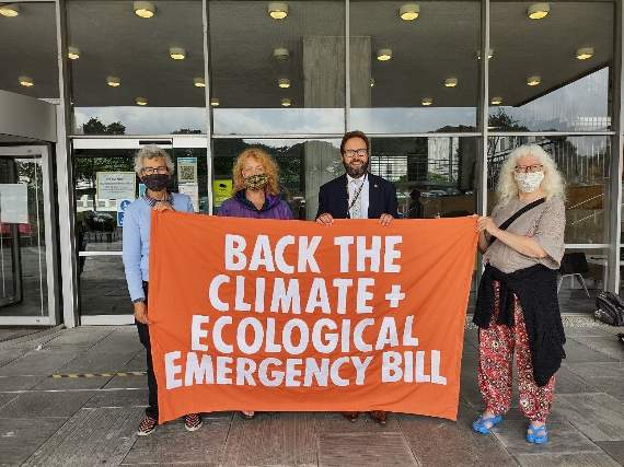 Councillors supporting the motion to back the CEE Bill outside county hall yesterday