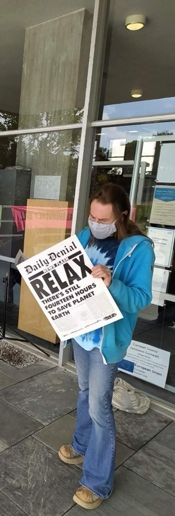 A campaigner outside county hall where Councillors were debating a motion to support the Climate and Ecological Emergency Bill