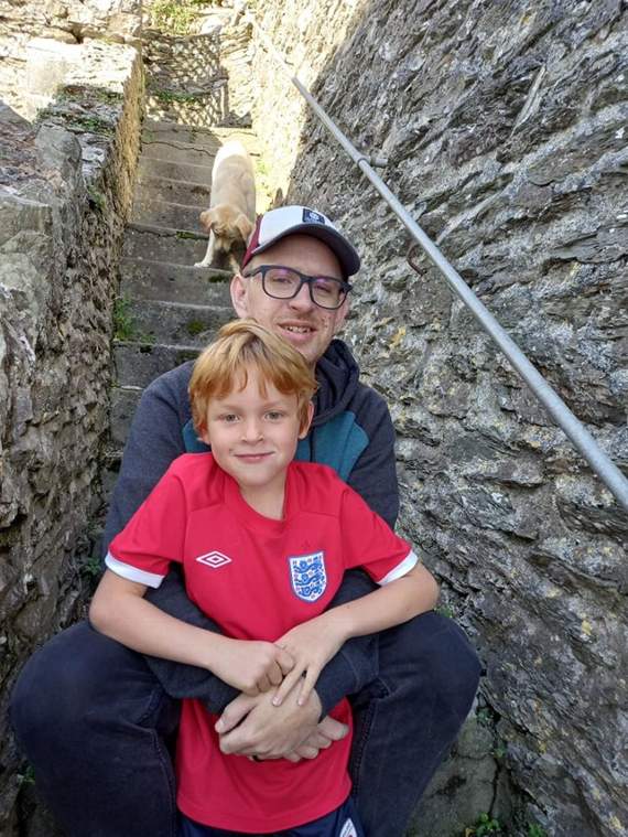 Author Roland Monger with his seven-year-old son Jake and their dog Bodhi