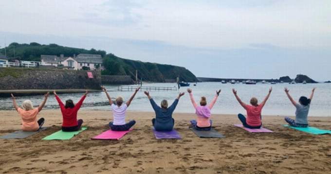 The beach yoga has offered people an alternative way to exercise during the ongoing uncertainties
