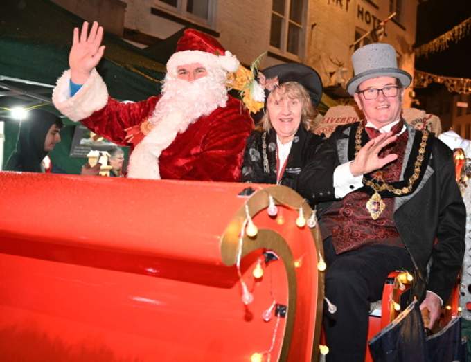 Father Christmas arrives in Launceston Square along with town Mayor Cllr Leighton Penhale and Mayoress Gillian Penhale