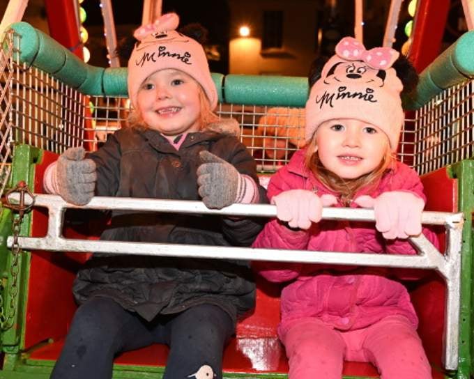 Cute together riding the mini wheel are Evie and Luna