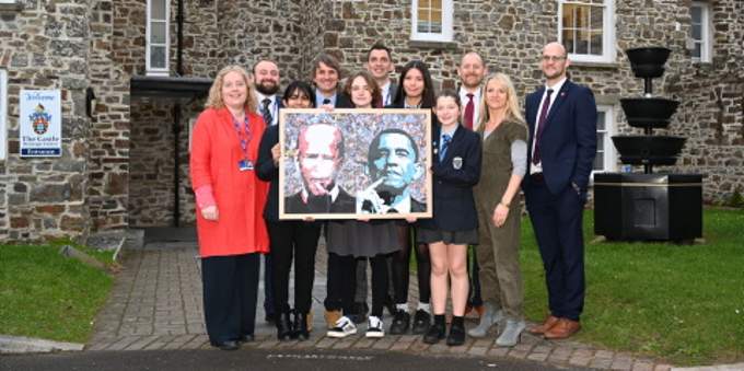Staff and pupils proudly show off their artwork outside the Castle at Bude. Picture: Adrian Jasper