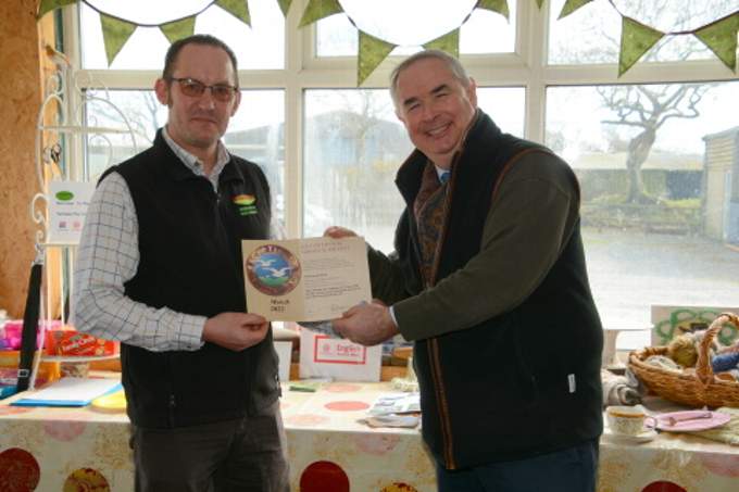 MP Geoffrey Cox presenting Mark Snook-Bevis with the award