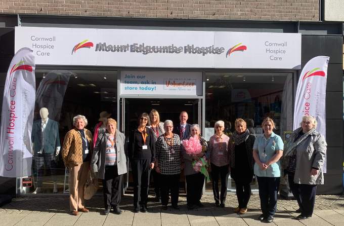 Cornwall Hospice Care staff and volunteers outside their new charity shop.
