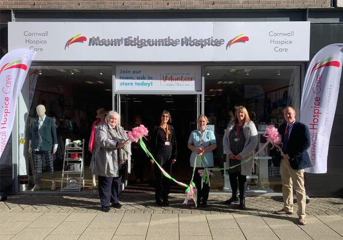 The ribbon cutting ceremony outside the new Cornwall Hospice Care charity shop at White River Place in St Austell.