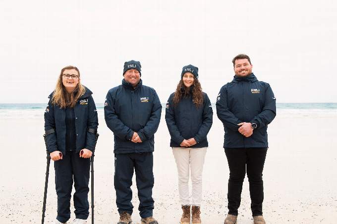 A group photo of a team of RNLI Face to Face fundraisers credit RNLI