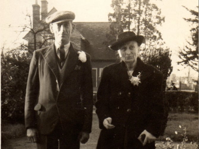 William Crumplin and his mother at a family wedding at Badshot Lea in 1949, in front of headteacher, Rankine’s, house