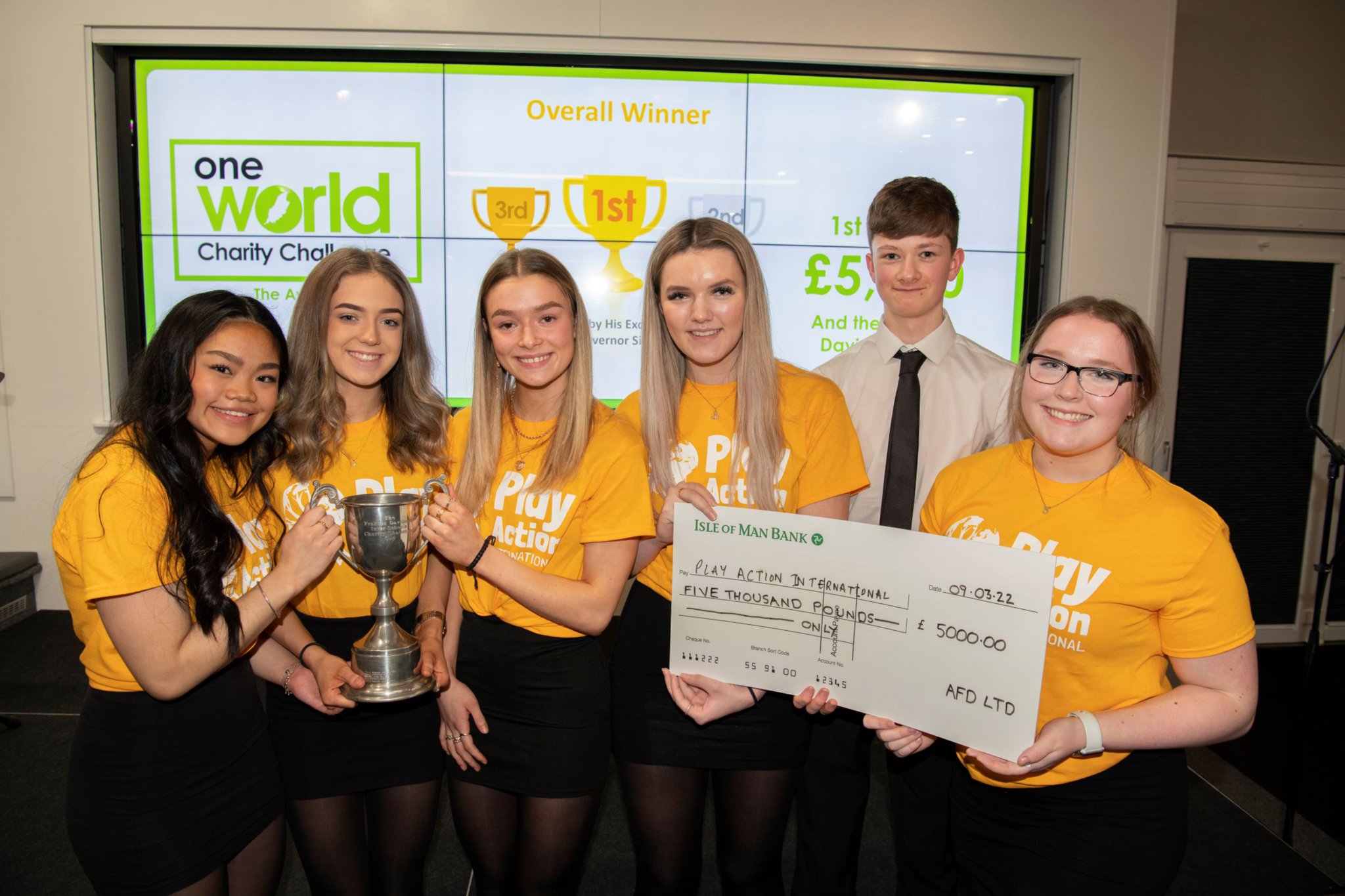 The victorious team from Ballakermeen celebrate winning £5,000 for Play Action International