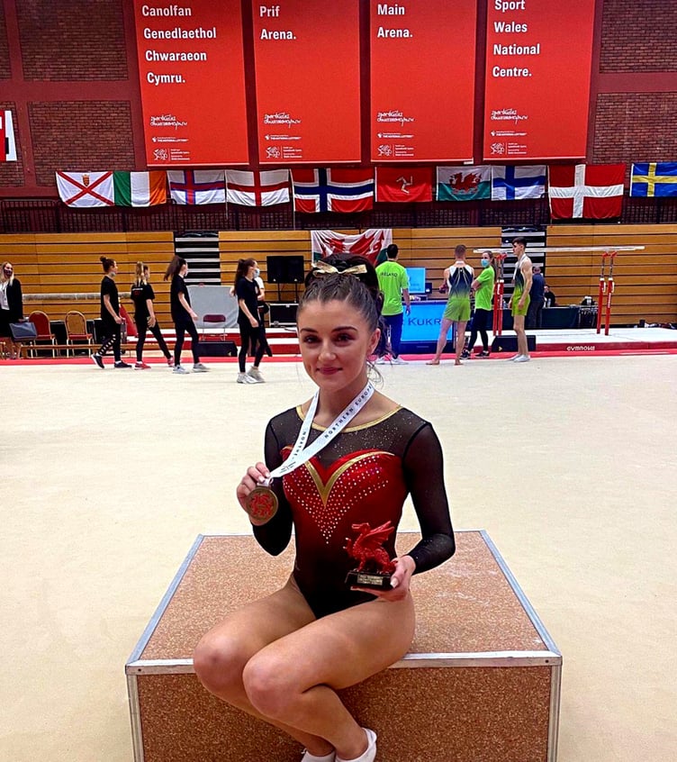 Tara Donnelly with her gold medal at the Northern European Gymnastics Championships in Wales