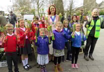 Cheery garlands bring spring optimism to town