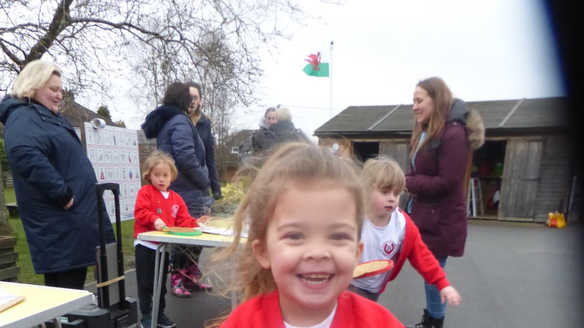 Badshot Lea Infants hold sponsored pancake race