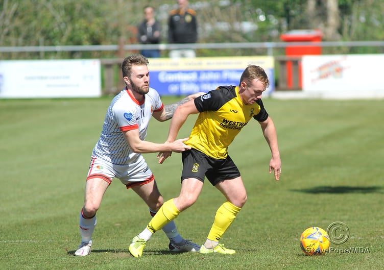 Action from Buckland Athletic’s hard-fought 0-0 draw at home to Tavistock on Good Friday.