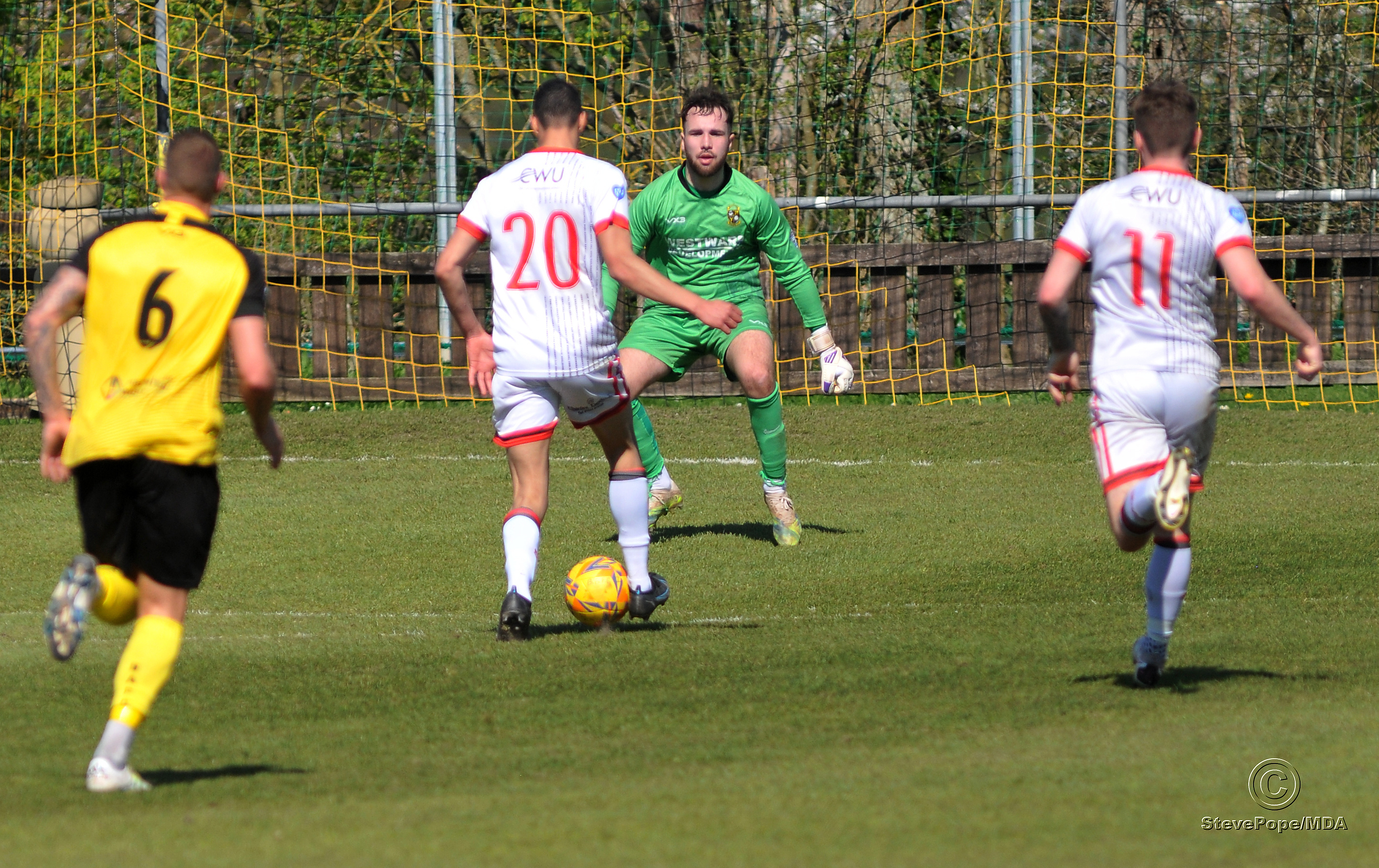 Action from Buckland Athletic’s hard-fought 0-0 draw at home to Tavistock on Good Friday.