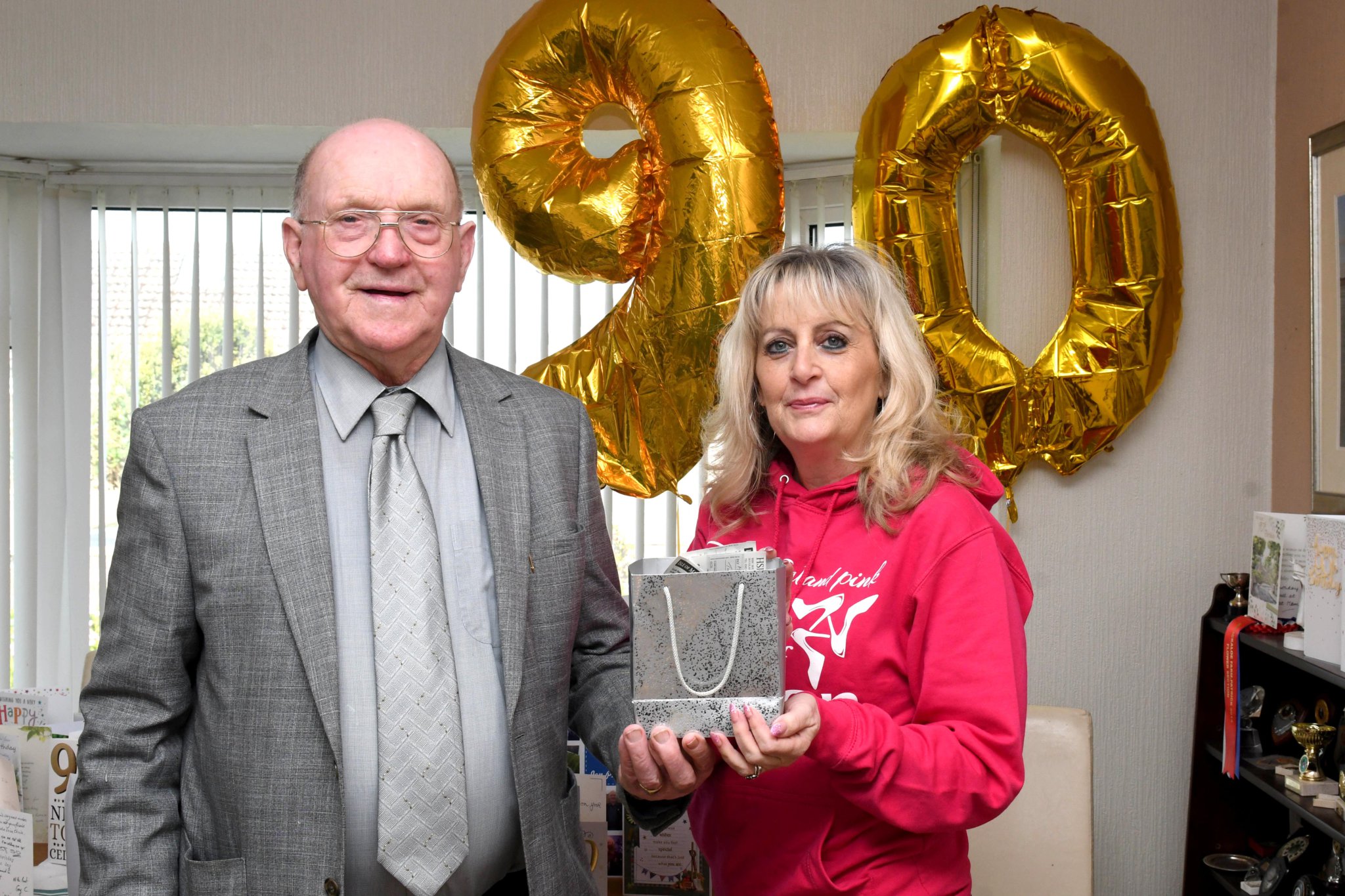 Former chairman of Peel Town Commissioners Robert Quayle donates £700 to the Manx Breast Cancer Support Group. For his 90th birthday he asked for donations in lieu of presents. Pictured is Robert Quayle and Karen Wagstaffe, secretary of the Manx Breast Cancer Support Group