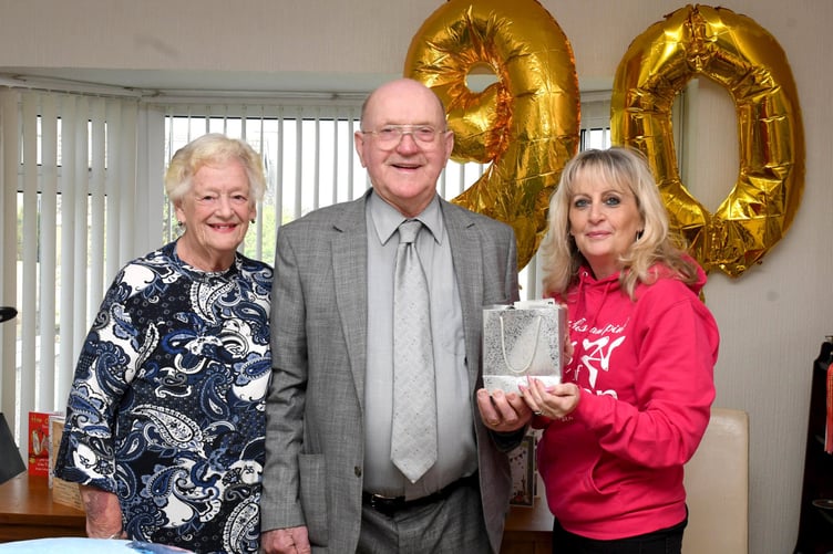Former chairman of Peel Town Commissioners Robert Quayle donates £700 to the Manx Breast Cancer Support Group. For his 90th birthday he asked for donations in lieu of presents. Pictured left to right: Muriel Quayle, Robert Quayle and Karen Wagstaffe, secretary of the Manx Breast Cancer Support Group