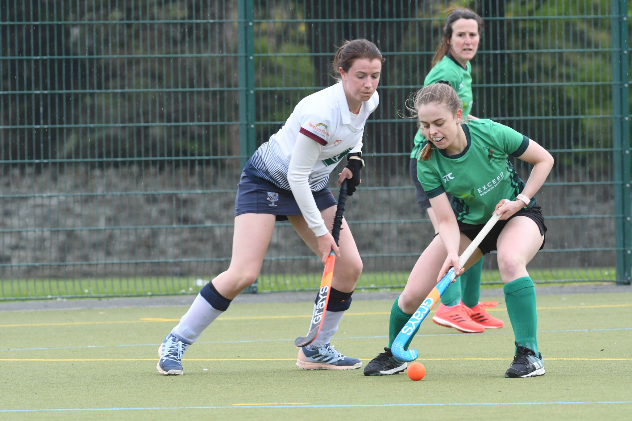 Lucy Kinrade of Bacchas A (left) closes down Ramsey A’s Ellie Burton during Saturday’s match in the north of the island (DK220430 (9))