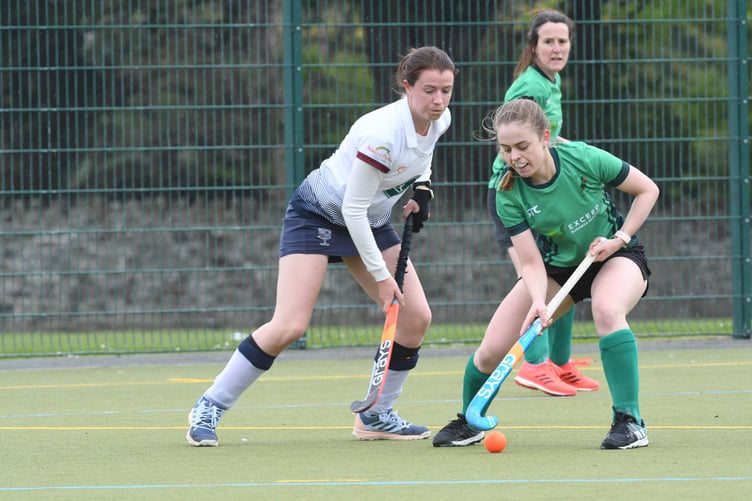 Lucy Kinrade of Bacchas A (left) closes down Ramsey A’s Ellie Burton during Saturday’s match in the north of the island (DK220430 (9))