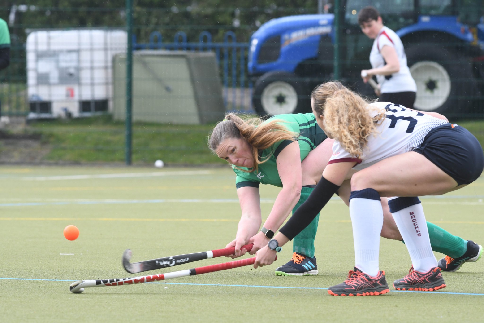 Ramsey B’s Jenny Lantry (green top) and Bacchas C’s Jan Lewis on the stretch as they battle for possession during Saturday’s Rossborough Women’s Division Two clash at Ramsey Grammar School. Lewis helped her side triumph 4-0 (DK220430(52))
