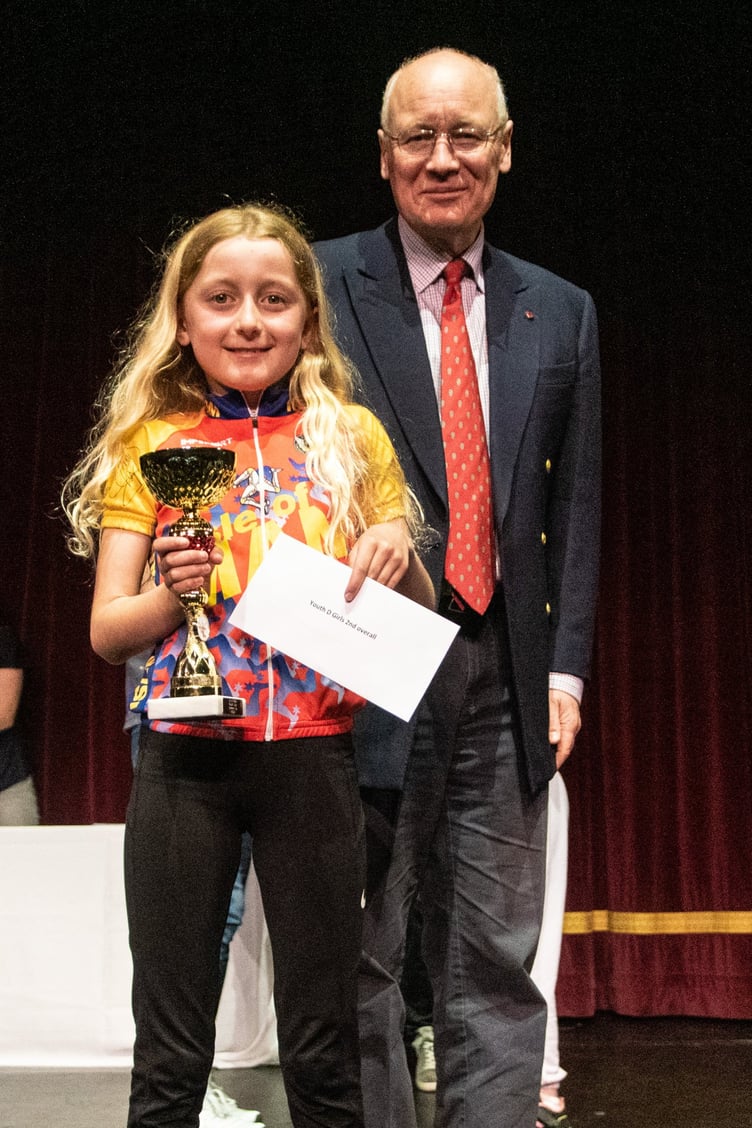 Poppy Clayton won Youth D Girls category overall. She is pictured receiving her award from the Lieutenant Governor Sir John Lorimer (Gary Jones/Manxman photos)