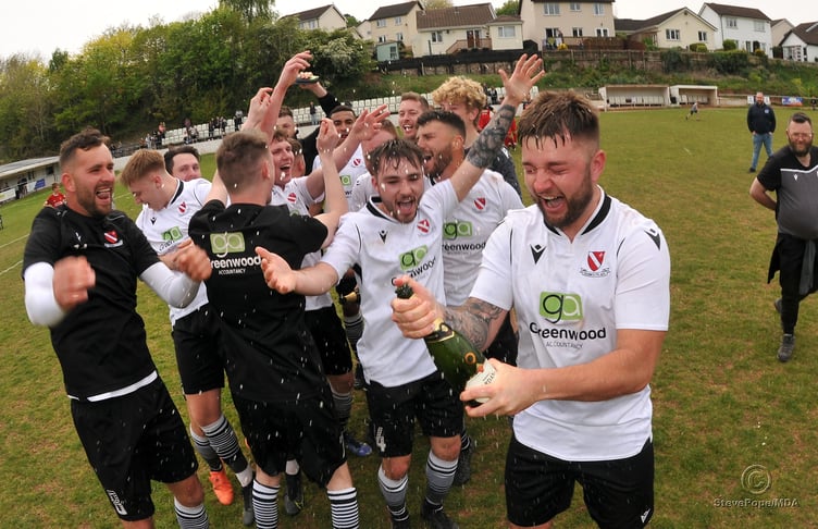 Action from Teignmouth’s clash with Plymstock United on Saturday – which saw the Teigns clinch the Devon Football League South & West title.