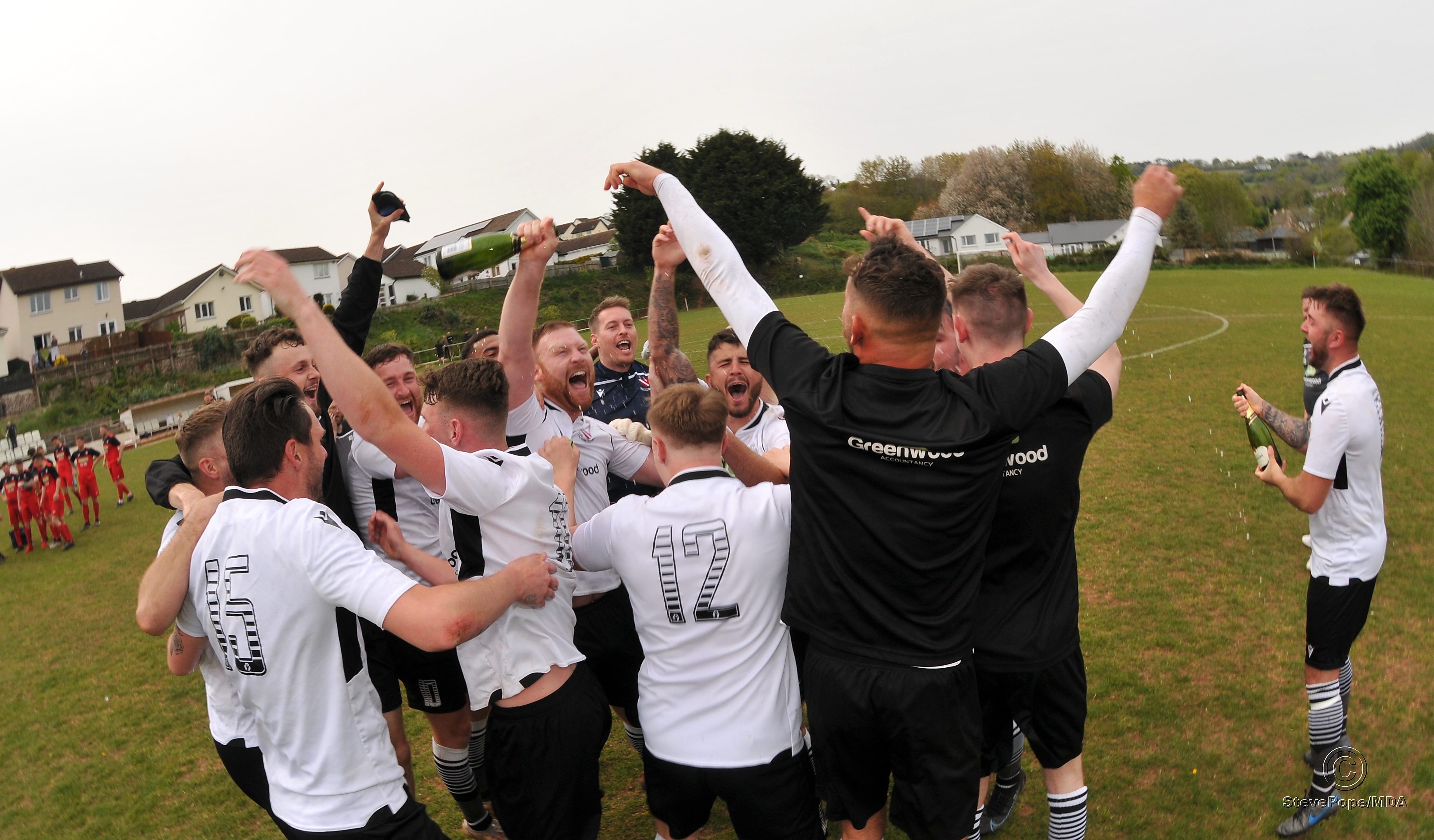 Action from Teignmouth’s clash with Plymstock United on Saturday – which saw the Teigns clinch the Devon Football League South & West title.