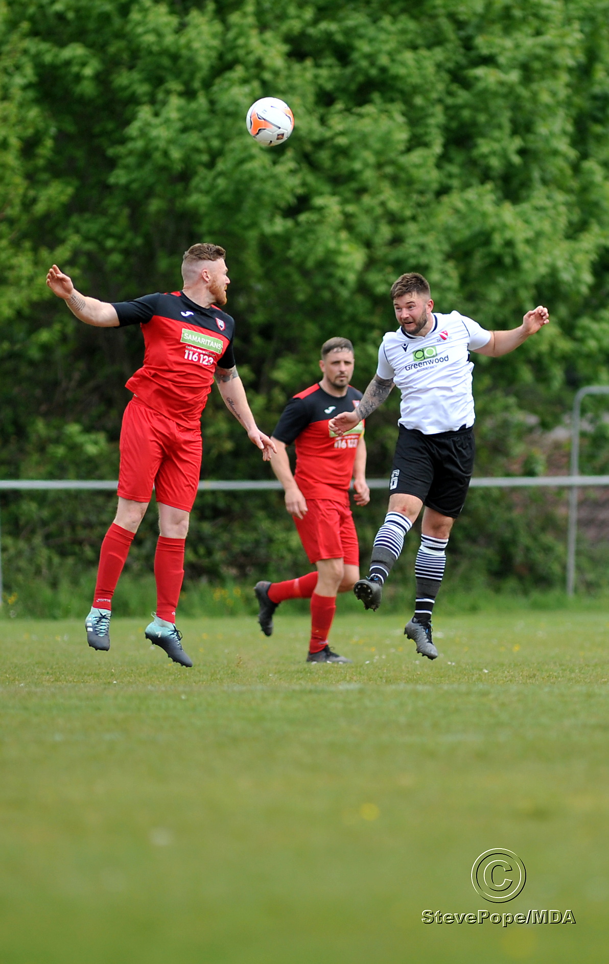 Action from Teignmouth’s clash with Plymstock United on Saturday – which saw the Teigns clinch the Devon Football League South & West title.
