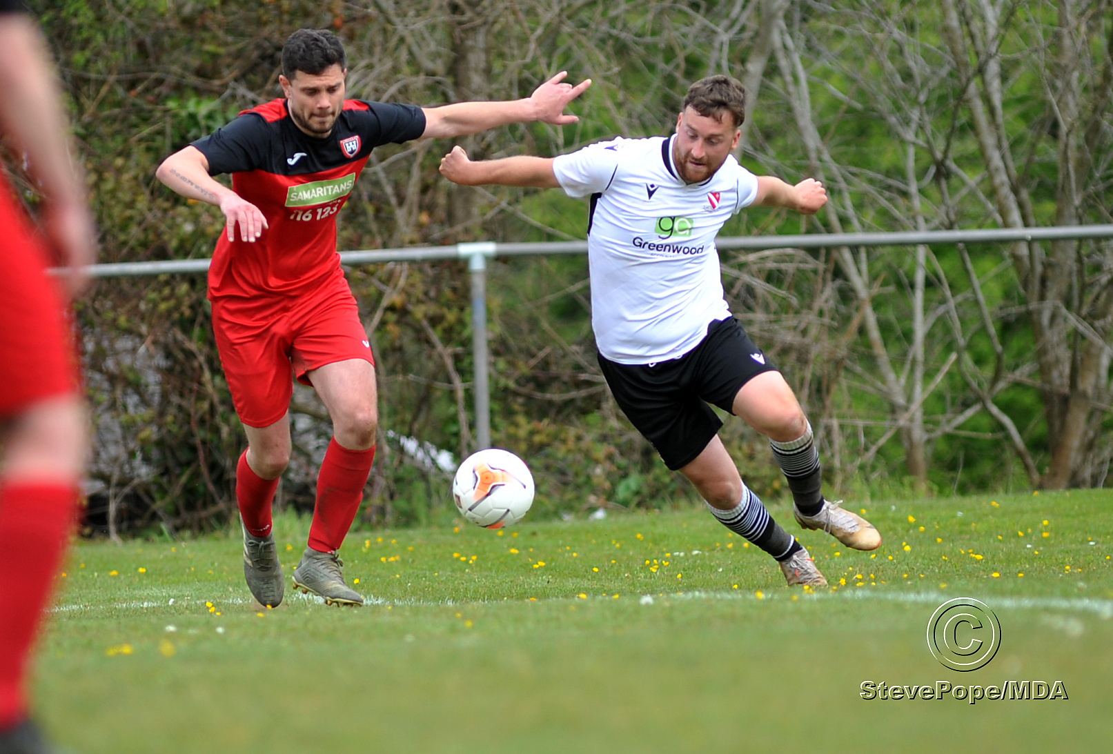 Action from Teignmouth’s clash with Plymstock United on Saturday – which saw the Teigns clinch the Devon Football League South & West title.