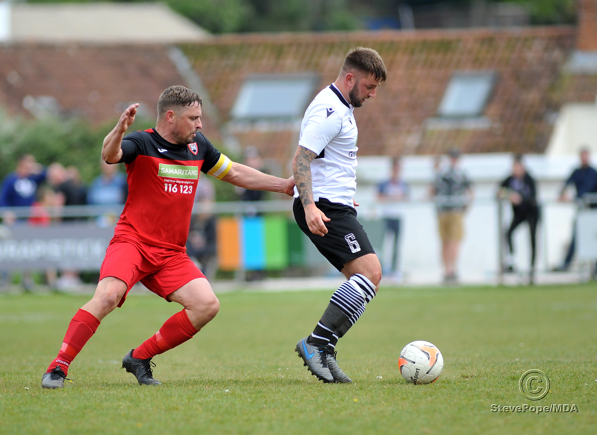 Action from Teignmouth’s clash with Plymstock United on Saturday – which saw the Teigns clinch the Devon Football League South & West title.