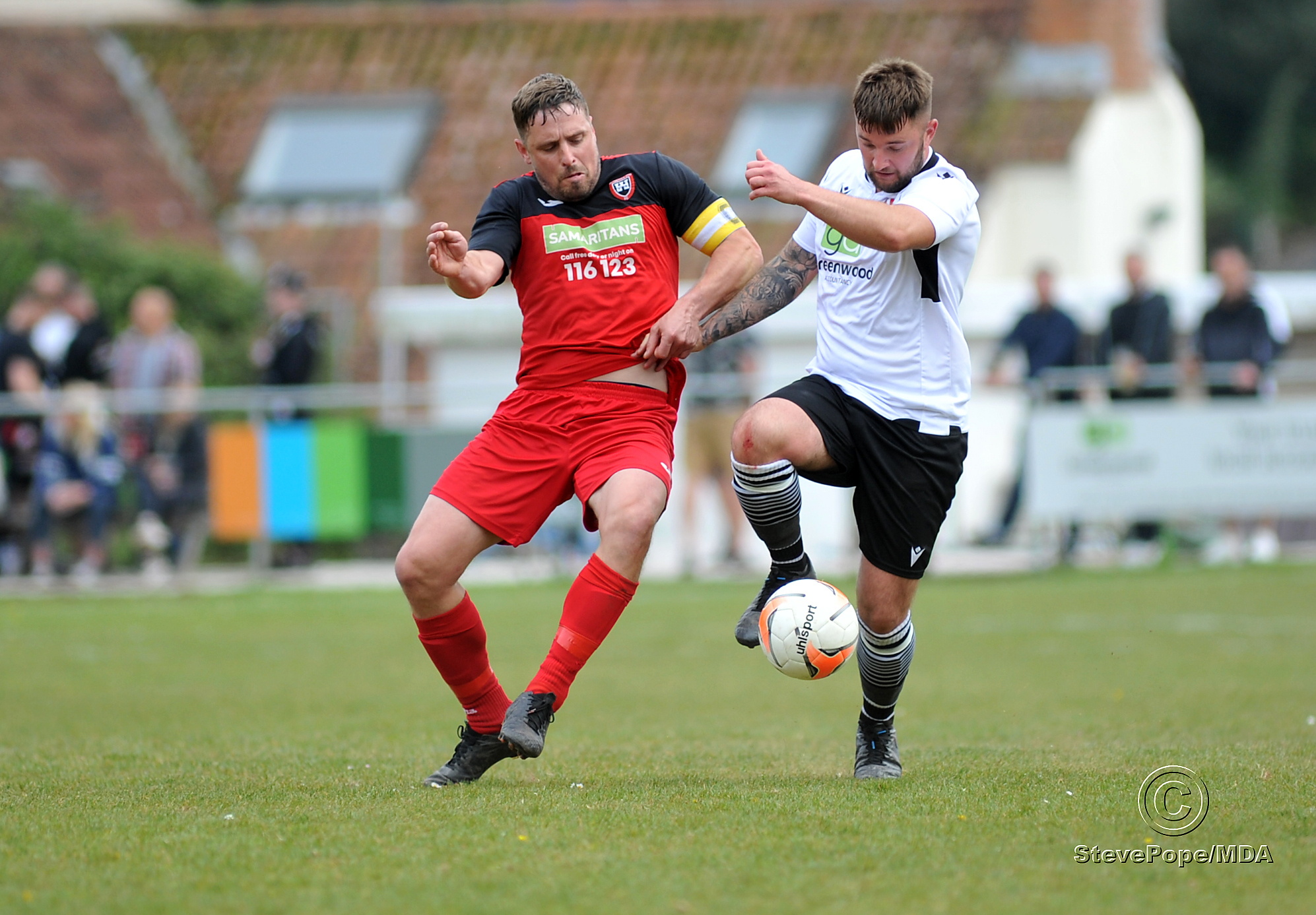 Action from Teignmouth’s clash with Plymstock United on Saturday – which saw the Teigns clinch the Devon Football League South & West title.