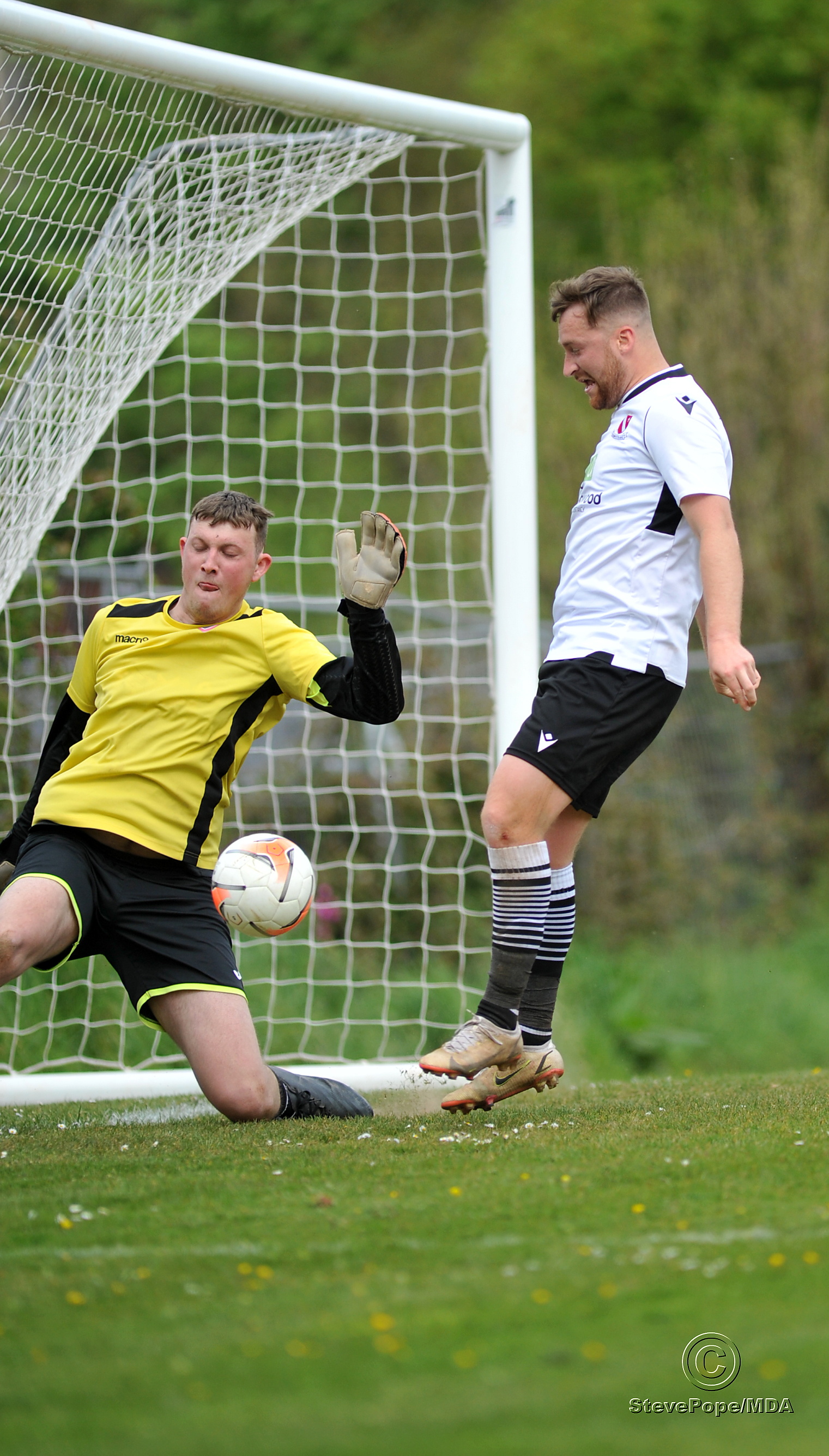 Action from Teignmouth’s clash with Plymstock United on Saturday – which saw the Teigns clinch the Devon Football League South & West title.