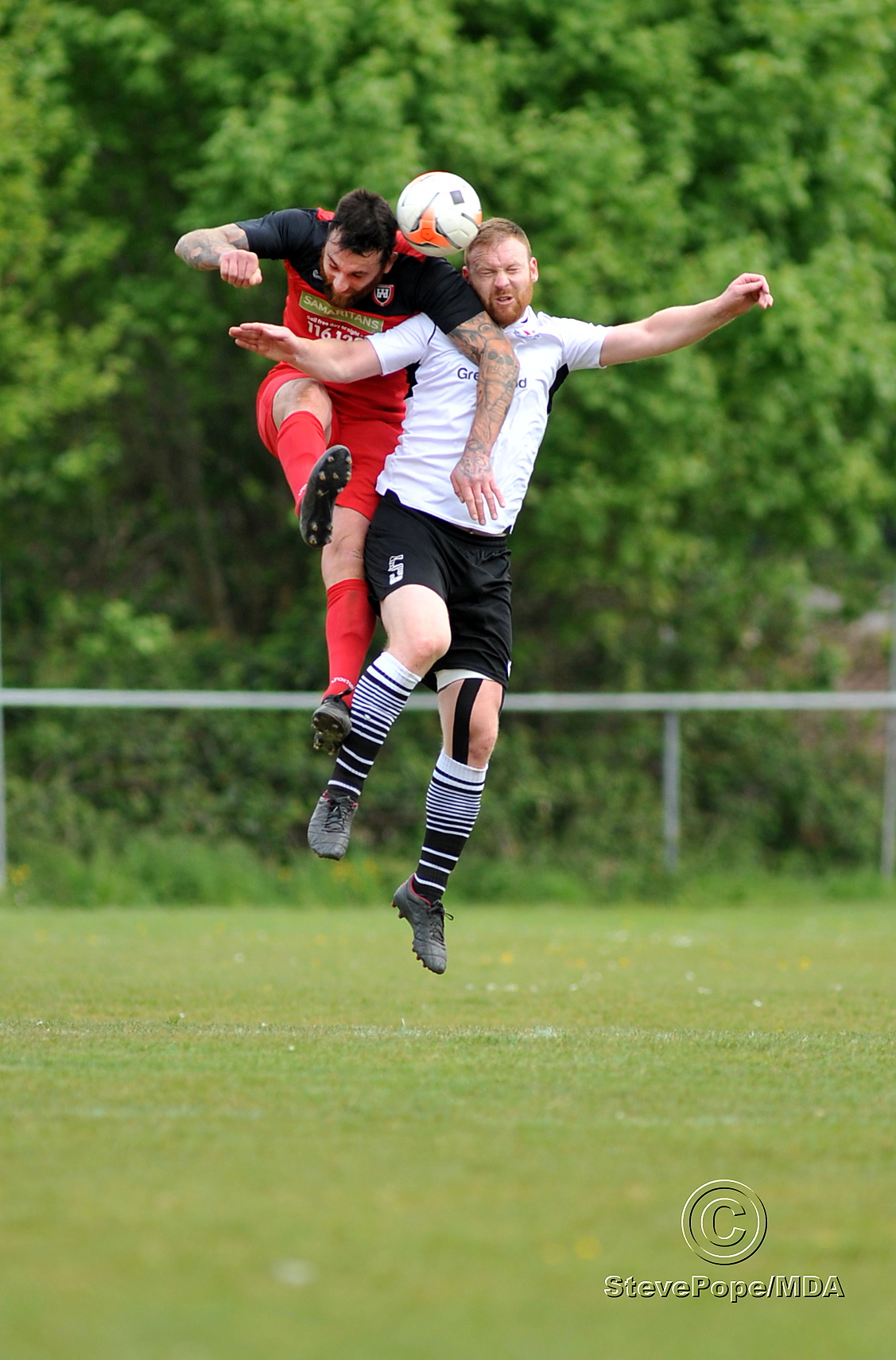 Action from Teignmouth’s clash with Plymstock United on Saturday – which saw the Teigns clinch the Devon Football League South & West title.