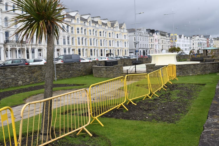 Barriers in use at the sunken gardens on Loch Promenade in Douglas -