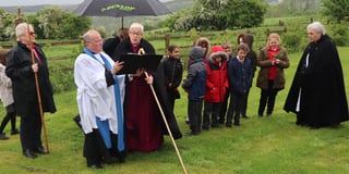 Bishop consecrates graveyard extension
