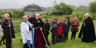 Bishop consecrates graveyard extension