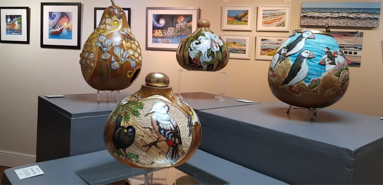 art works from the 'A Very Manx View' exhibition at the Hodgson Loom Gallery