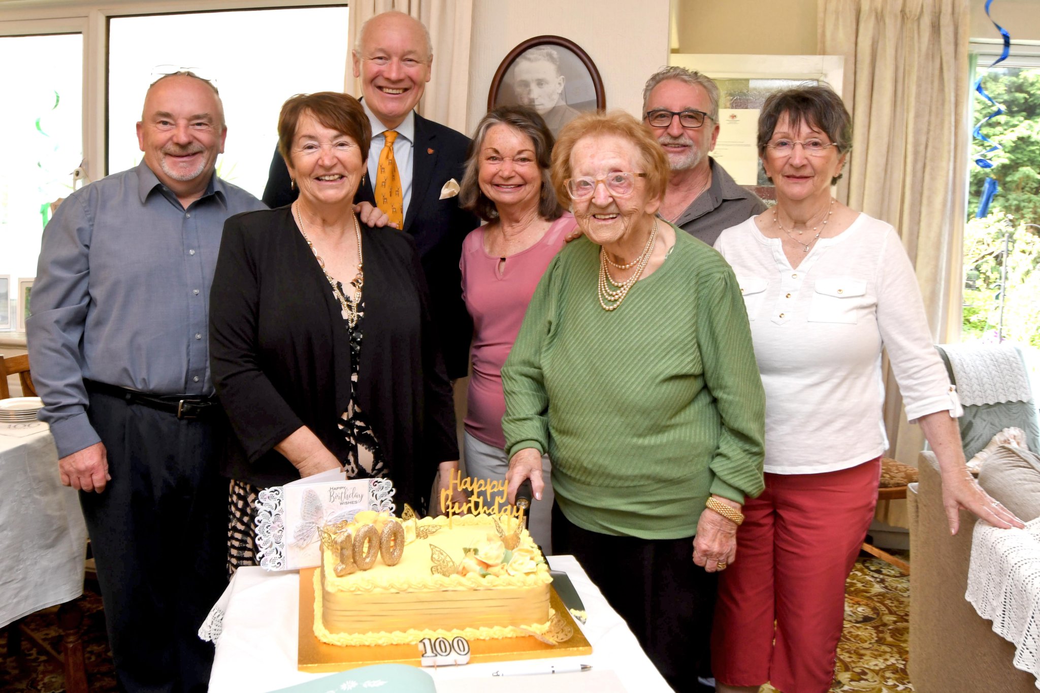 Mrs May Corlett celebrates her 100th birthday - pictured left to right: David Corlett, Cathy Cowell, Lieutenant Governor Sir John Lorimer, Elaine Shepherd, May Corlett, Graham Corlett, Lin Maxfield