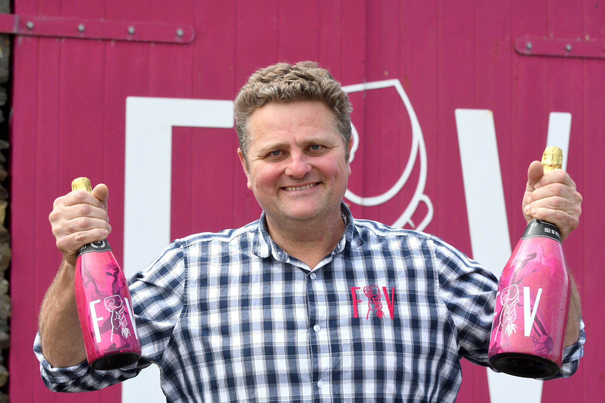 Port Erin-based winery Foraging Vintners are supplying the sparkling wine to be used on the podium at the upcoming TT Races - pictured is co-owner Ian Swindells